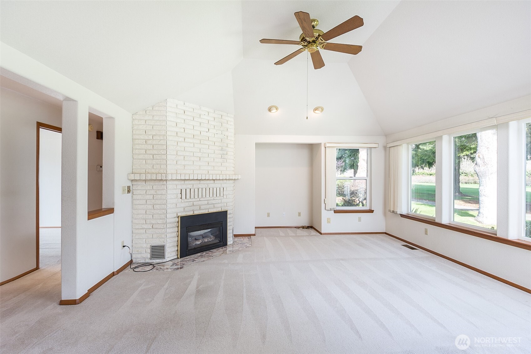 170 Hurricane Ridge Drive Sequim, WA 98382 - Photo 16 of 39 a view of empty room with fireplace and fan