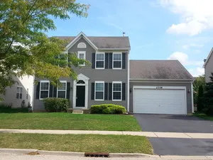 front view of house with a yard