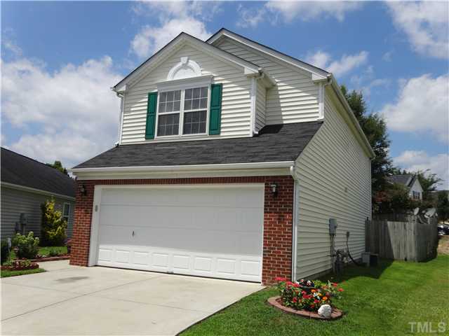 2208 Tucca Way Raleigh, NC 27604 - Photo 1 of 18 a front view of a house with a yard