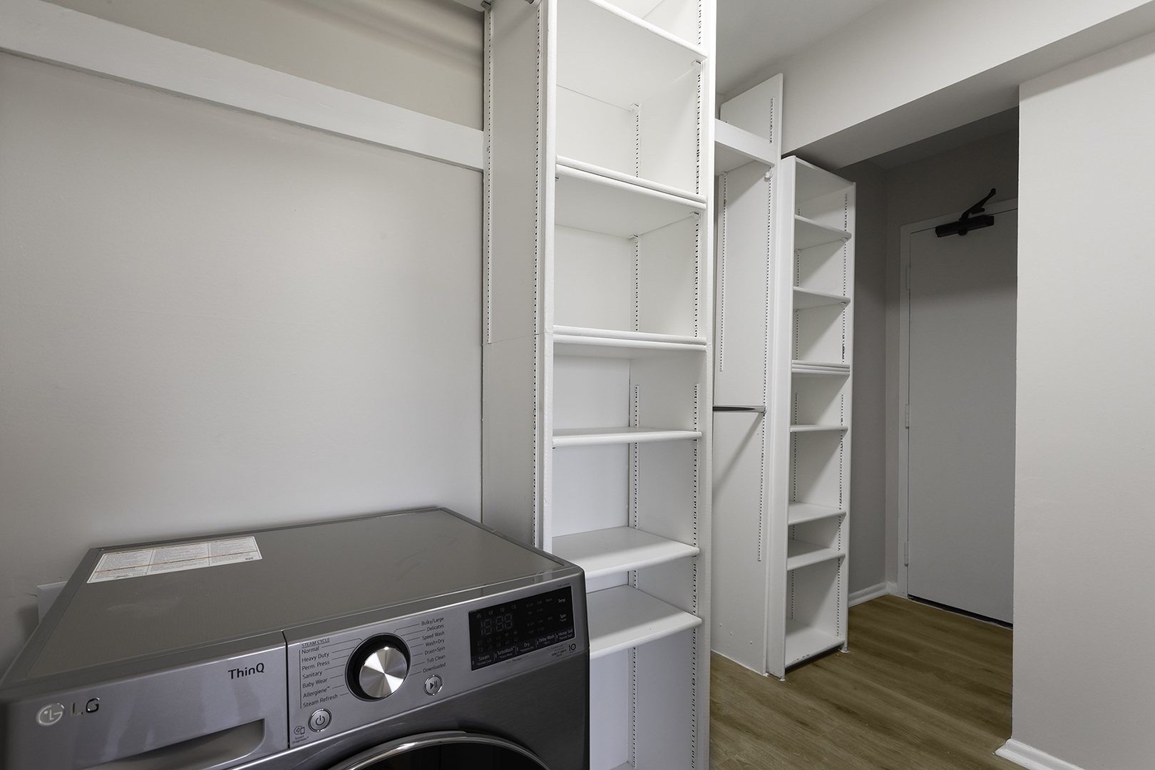 6166 North Sheridan Road, Unit 28A Chicago, IL 60660 - Photo 8 of 18 a view of an empty room with wooden floor