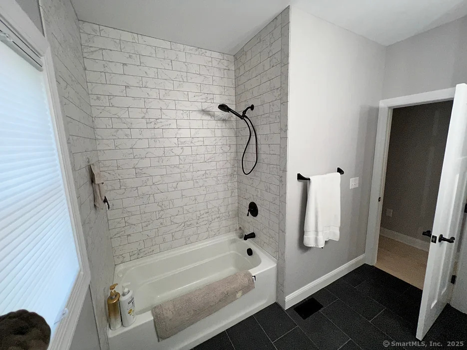 140 Corbin Ridge Bristol, CT 06010 - Photo 7 of 7 a bathroom with a bathtub and a shower