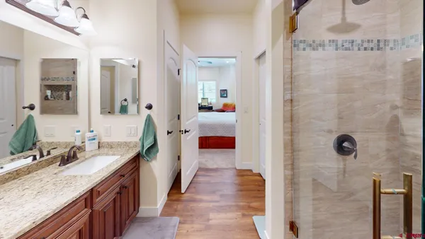 a livingroom with workspace couch and a window