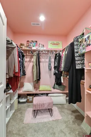 a very nice looking room with a sink and a mirror