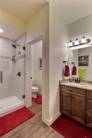 a kitchen with stainless steel appliances granite countertop a stove and a sink