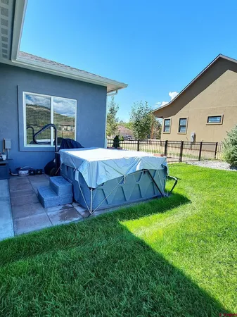 an aerial view of a house with a garden