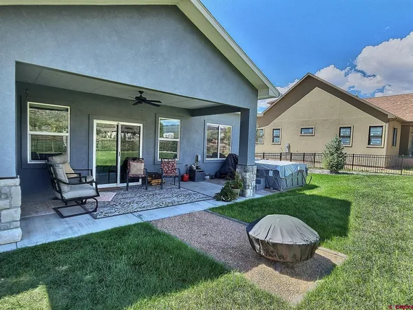 an aerial view of houses with outdoor space