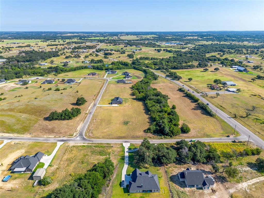 2000 Carrie Court Weatherford, TX 76088 - Photo 10 of 11 an aerial view of residential houses with outdoor space