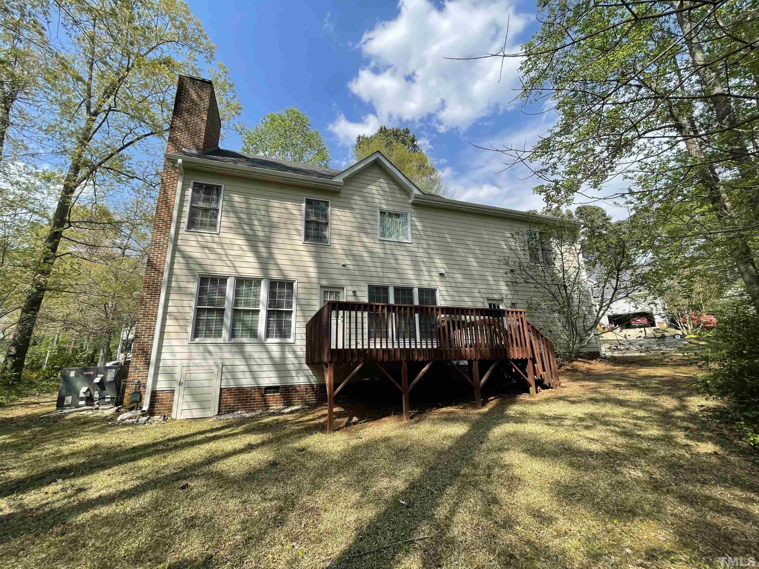 3401 Savan Court Raleigh, NC 27613 - Photo 27 of 27 a view of a house with a yard