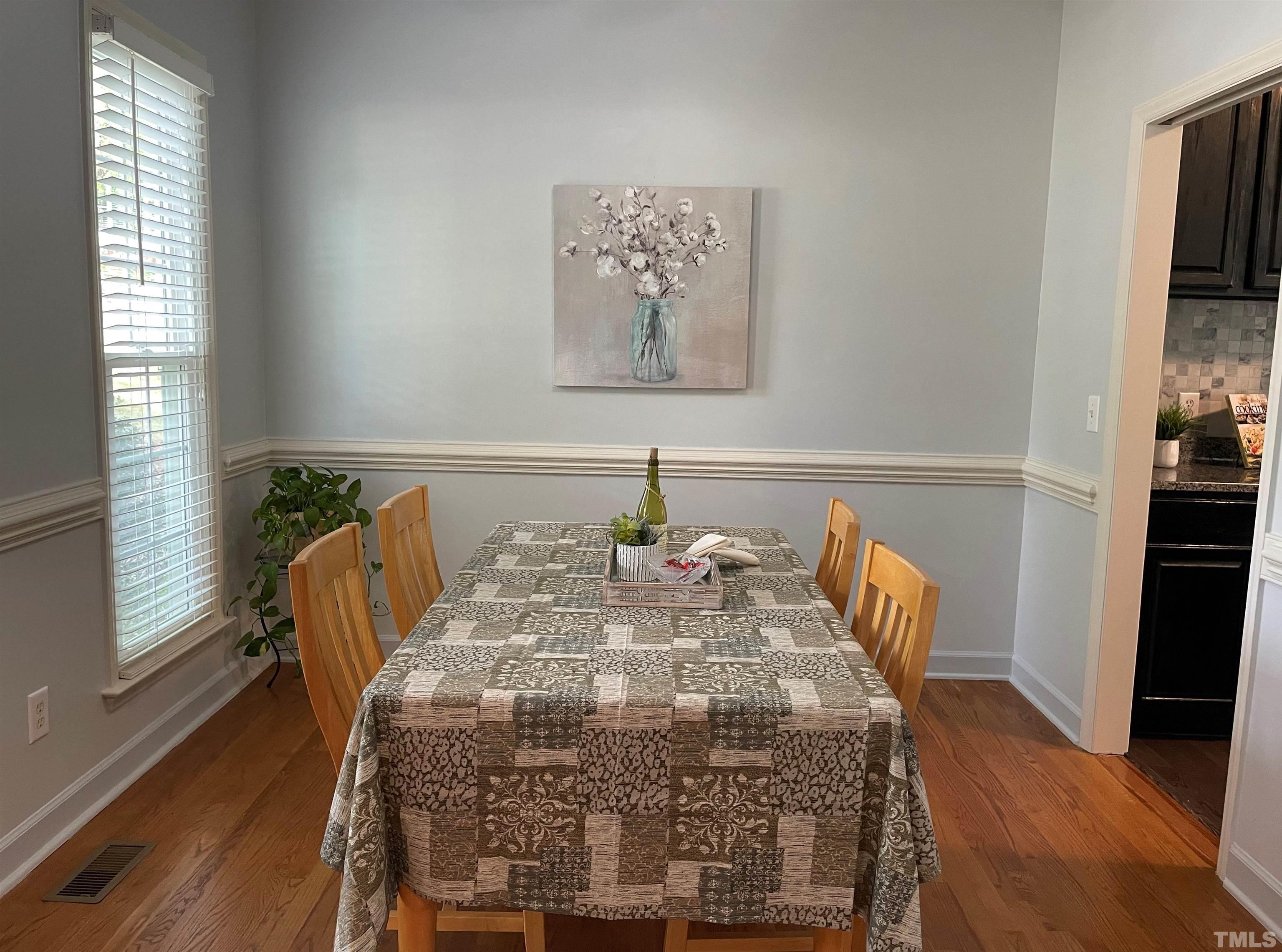 3401 Savan Court Raleigh, NC 27613 - Photo 8 of 27 a close view of dining table