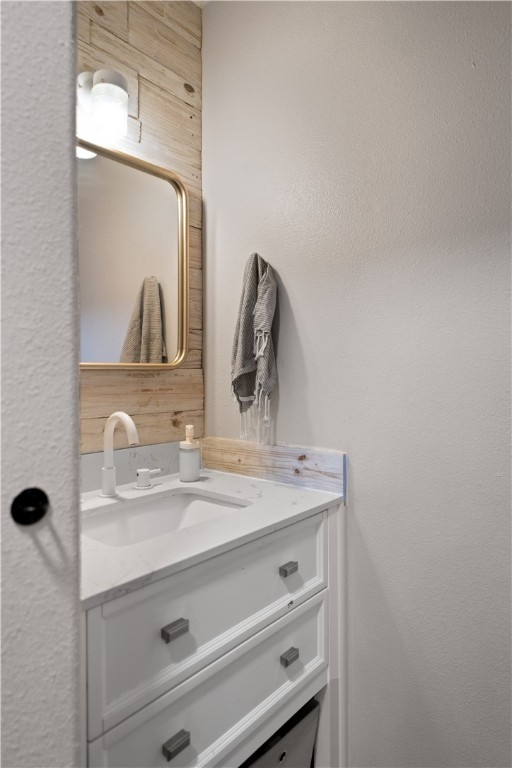7654 Timber Crest Drive Corpus Christi, TX 78413 - Photo 12 of 35 a bathroom with a sink and a mirror
