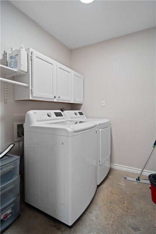 7654 Timber Crest Drive Corpus Christi, TX 78413 - Photo 13 of 35 a utility room with dryer and washer