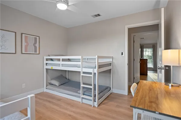 a room that has a window and a table in it