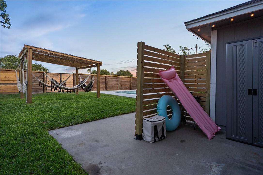 7654 Timber Crest Drive Corpus Christi, TX 78413 - Photo 27 of 35 a view of a deck with a backyard