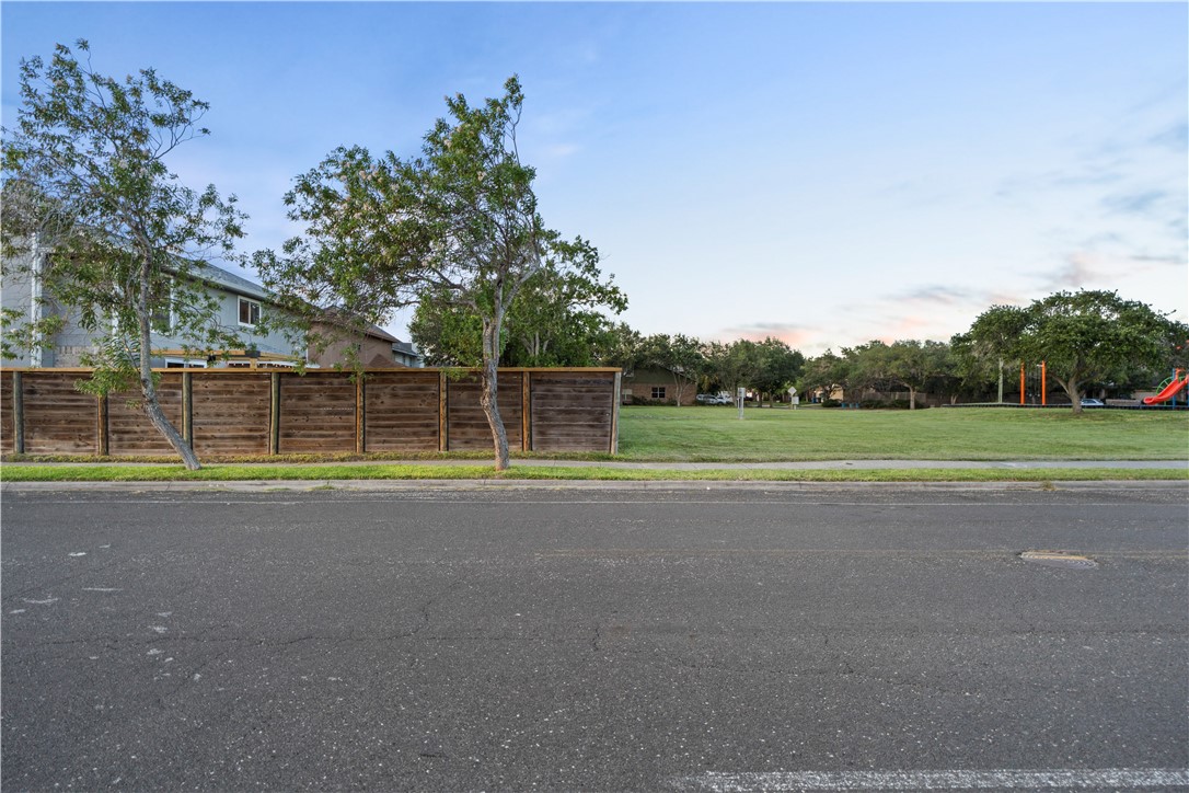 7654 Timber Crest Drive Corpus Christi, TX 78413 - Photo 34 of 35 a view of a tennis ground with large trees