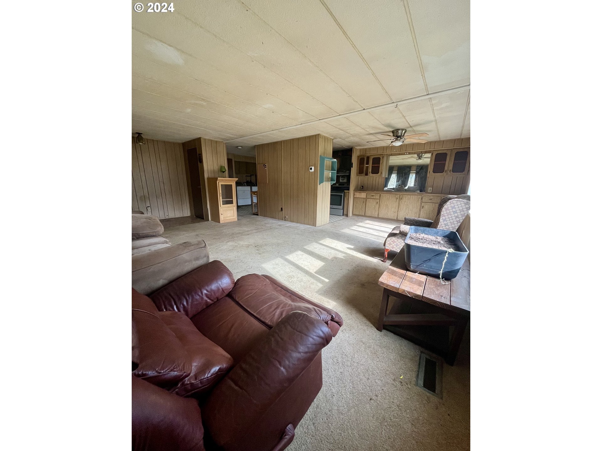 73030 Beaver Springs Road Rainier, OR 97048 - Photo 3 of 15 a living room with furniture and a fireplace