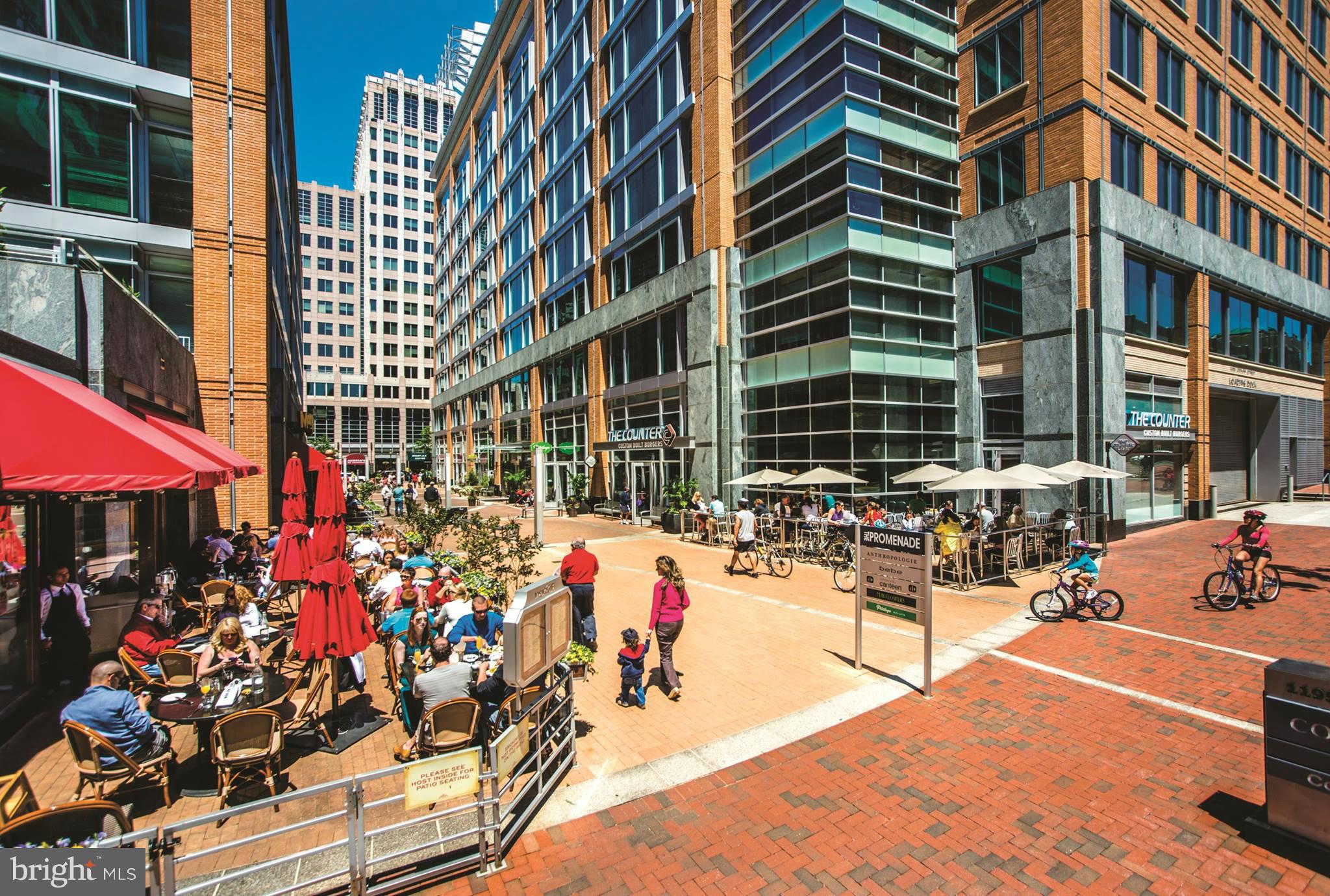 11990 Market Street, Unit 1712 Reston, VA 20190 - Photo 12 of 16 Al fresco dining just steps from your front door