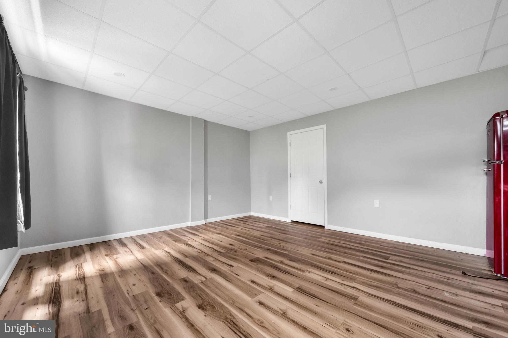 3706 Garrett Road Drexel Hill, PA 19026 - Photo 11 of 15 a view of room with wooden floor