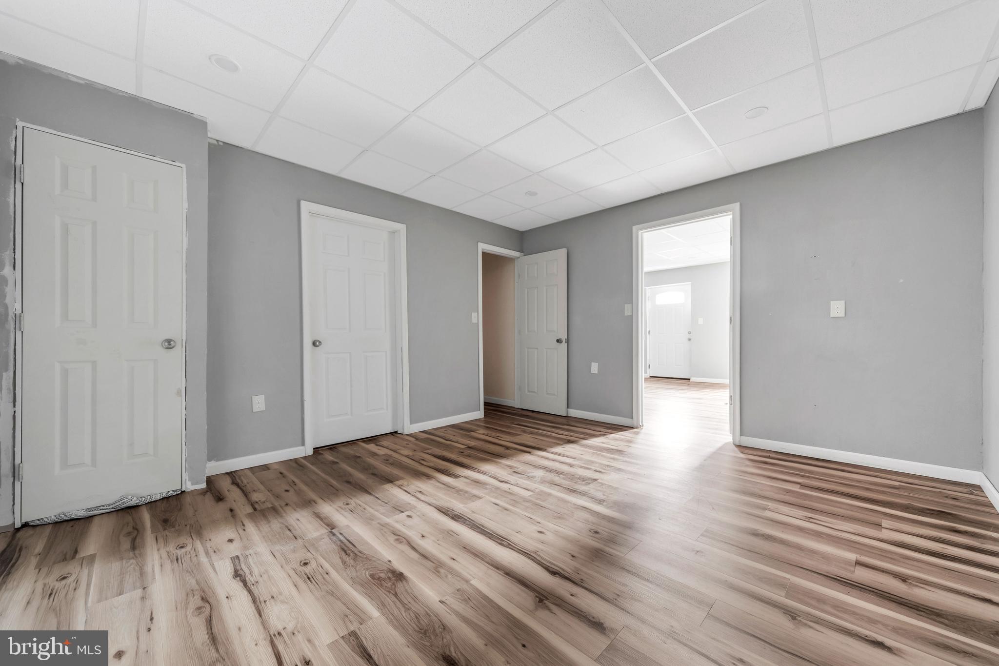 3706 Garrett Road Drexel Hill, PA 19026 - Photo 14 of 15 a view of an empty room with wooden floor
