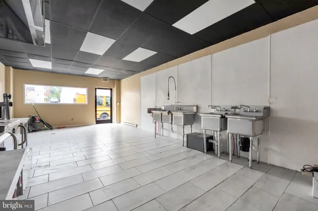 a view of kitchen with furniture and window