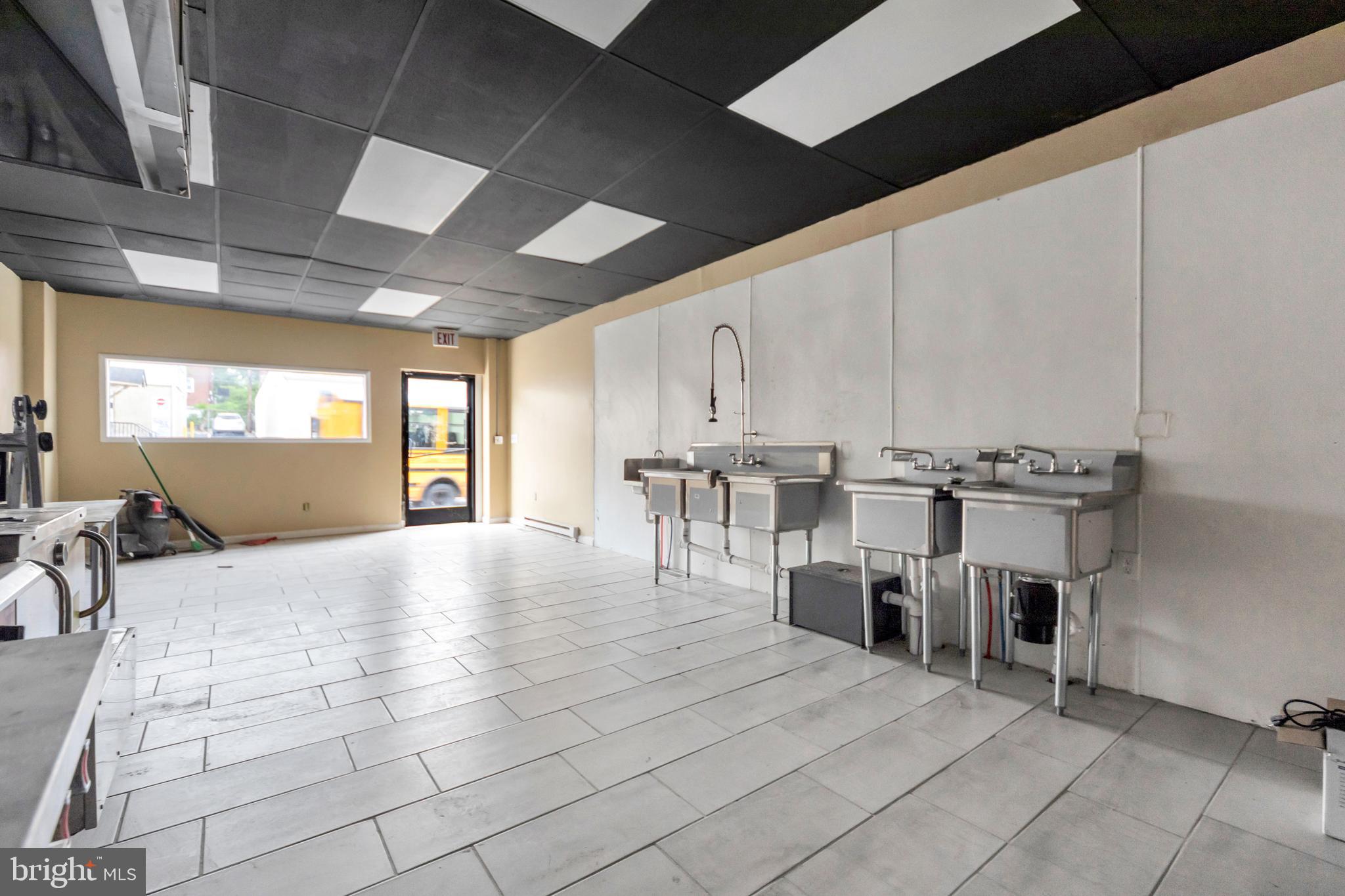 3706 Garrett Road Drexel Hill, PA 19026 - Photo 6 of 15 a view of kitchen with furniture and window