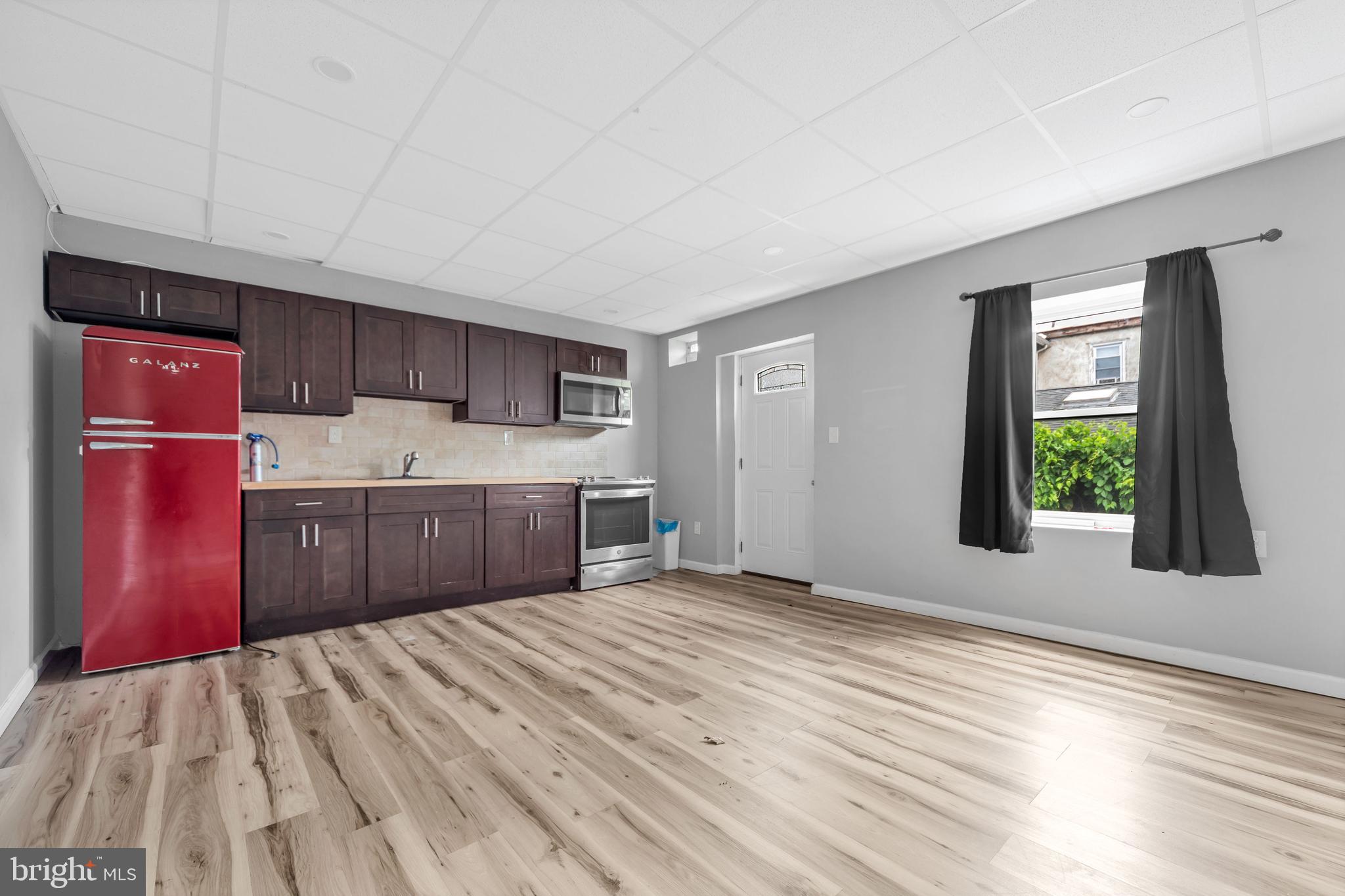 3706 Garrett Road Drexel Hill, PA 19026 - Photo 9 of 15 a room with a bed and a dresser