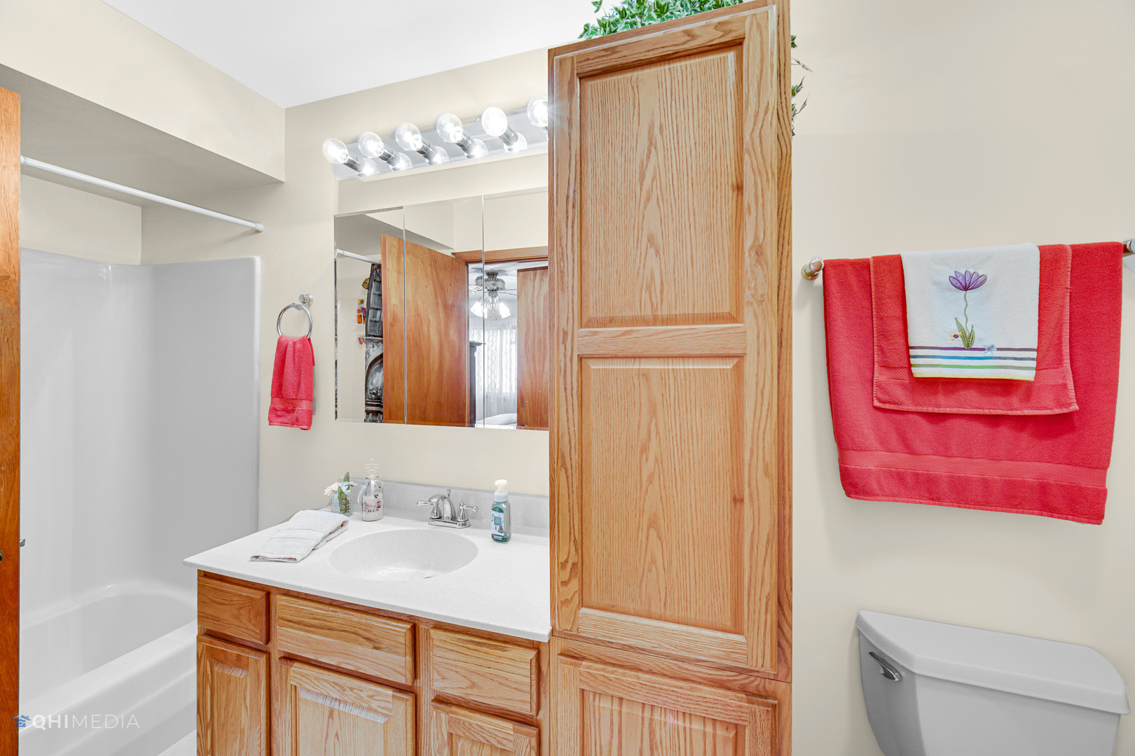 17638 Wright Street Lansing, IL 60438 - Photo 16 of 30 a bathroom with a sink vanity and a mirror