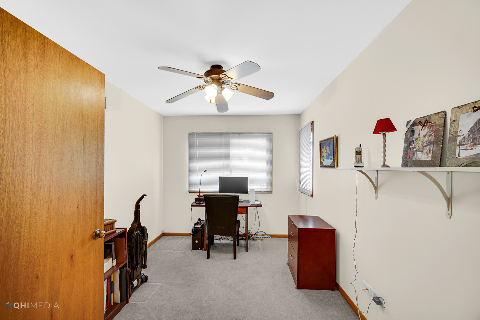 17638 Wright Street Lansing, IL 60438 - Photo 18 of 30 a view of a workspace with furniture and a window