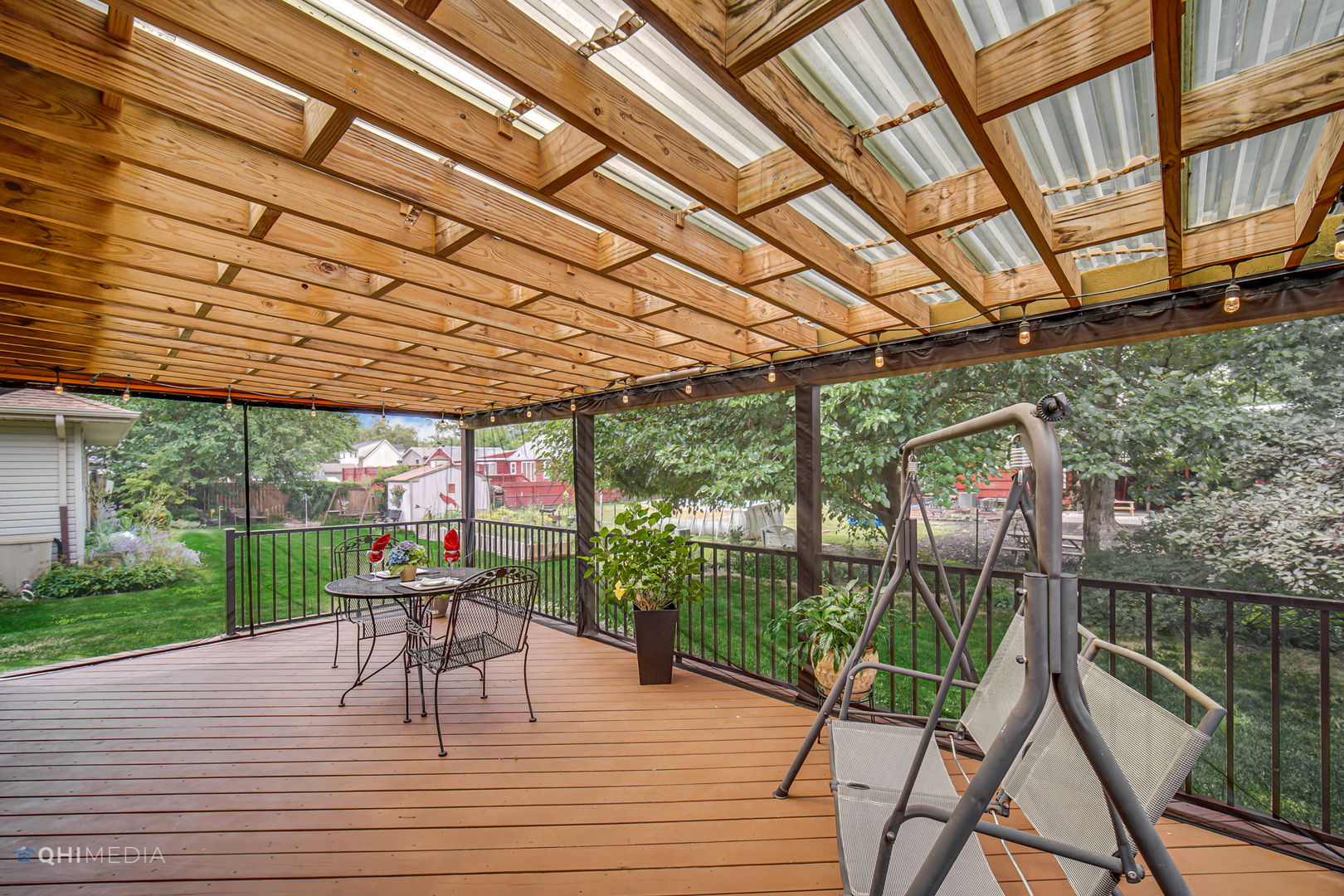 17638 Wright Street Lansing, IL 60438 - Photo 24 of 30 a view of a patio with a table chairs and a backyard