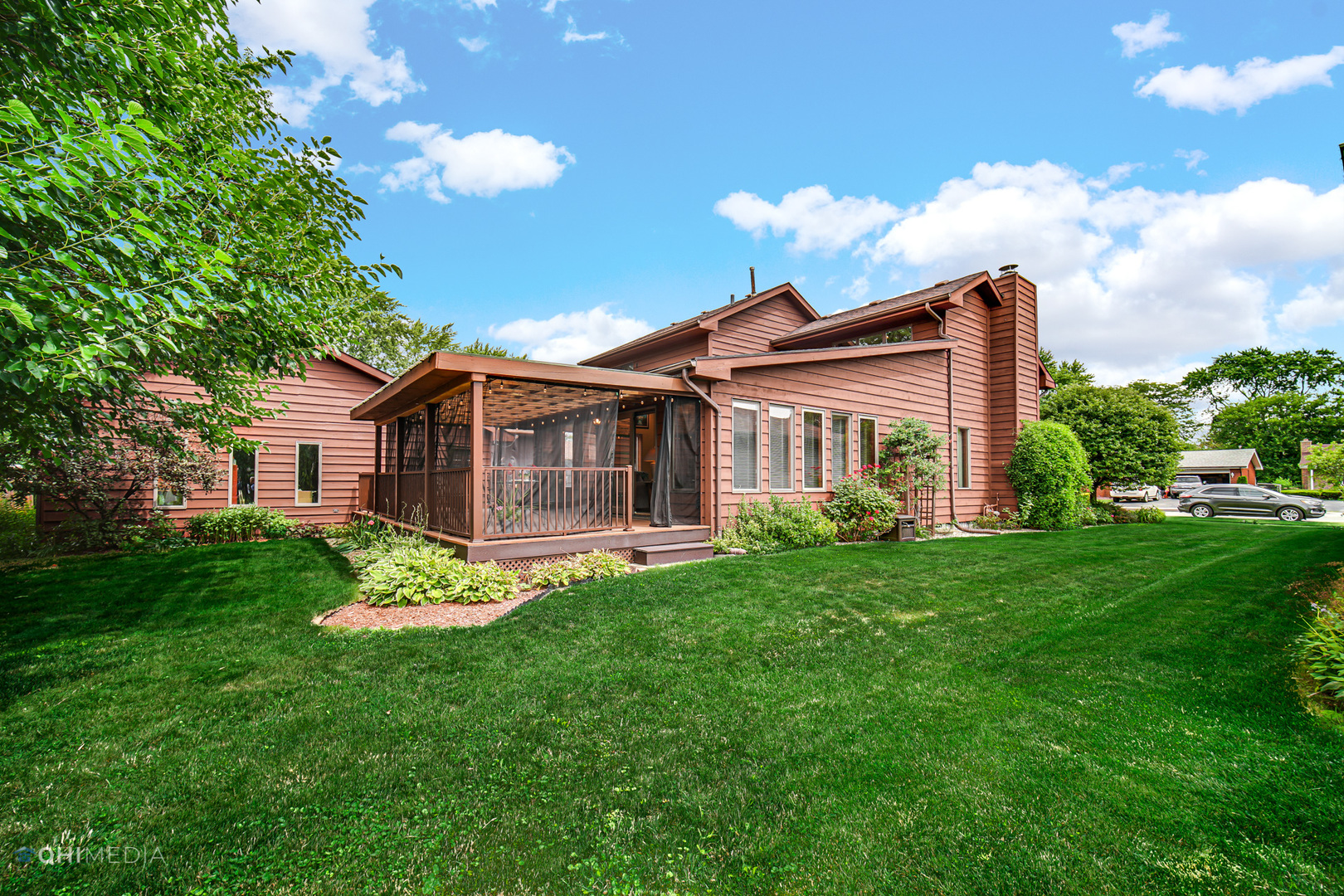 17638 Wright Street Lansing, IL 60438 - Photo 5 of 30 a front view of a house with a garden and plants