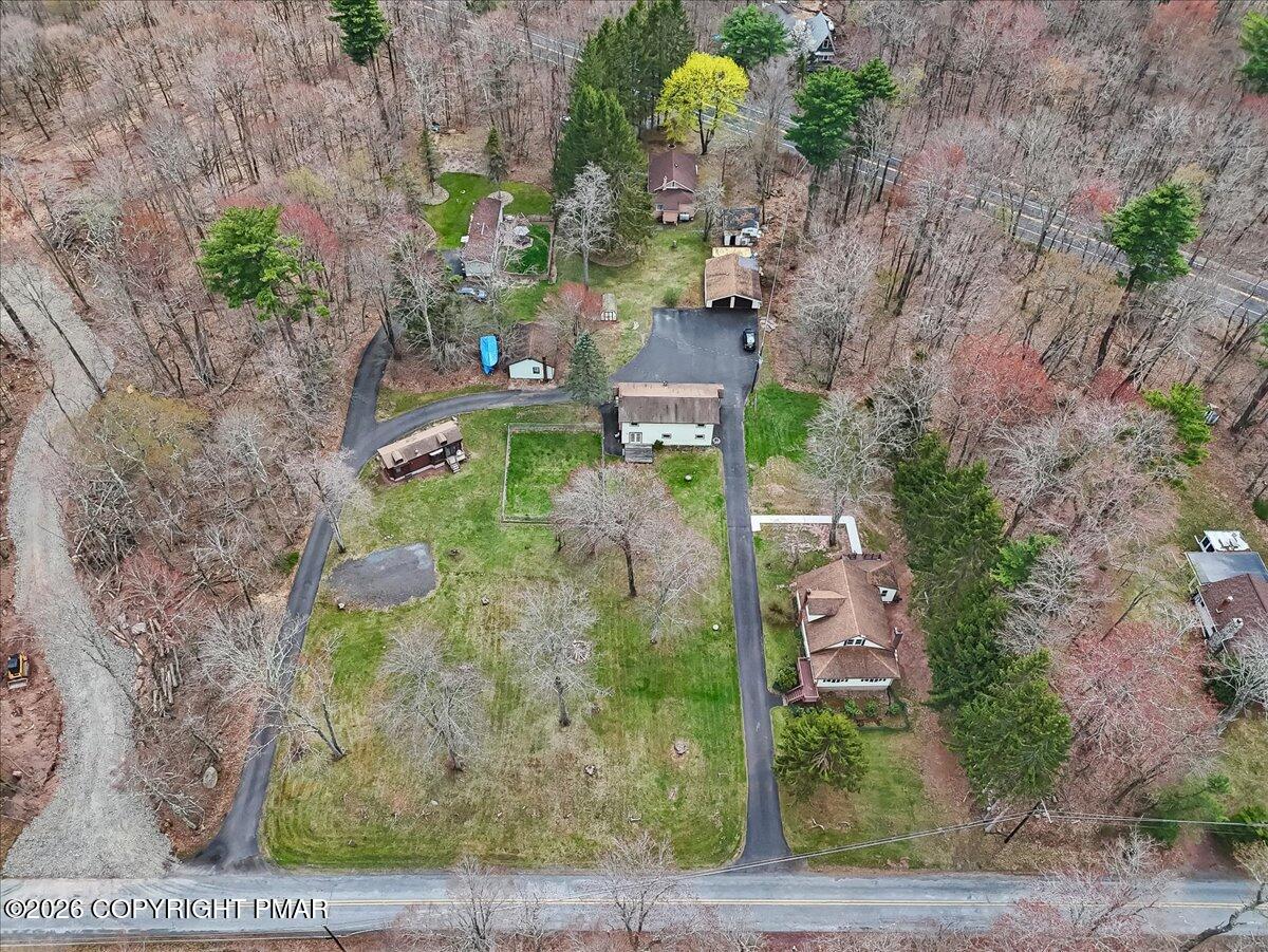 253 Thomas Road Blakeslee, PA 18610 - Photo 61 of 63 an aerial view of a house with a yard