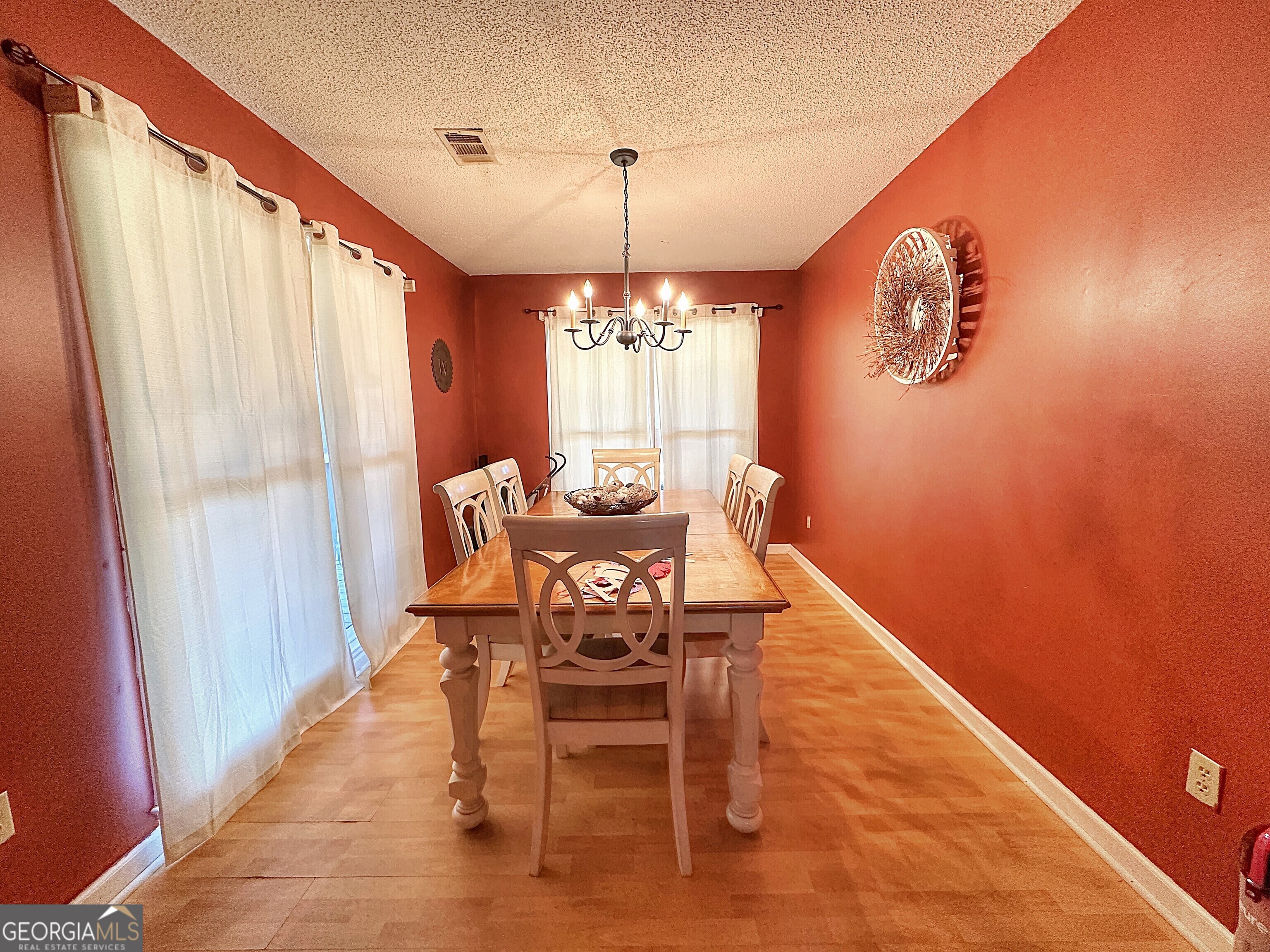 3900 Greenville Road LaGrange, GA 30241 - Photo 5 of 12 a view of a dining room with furniture and window