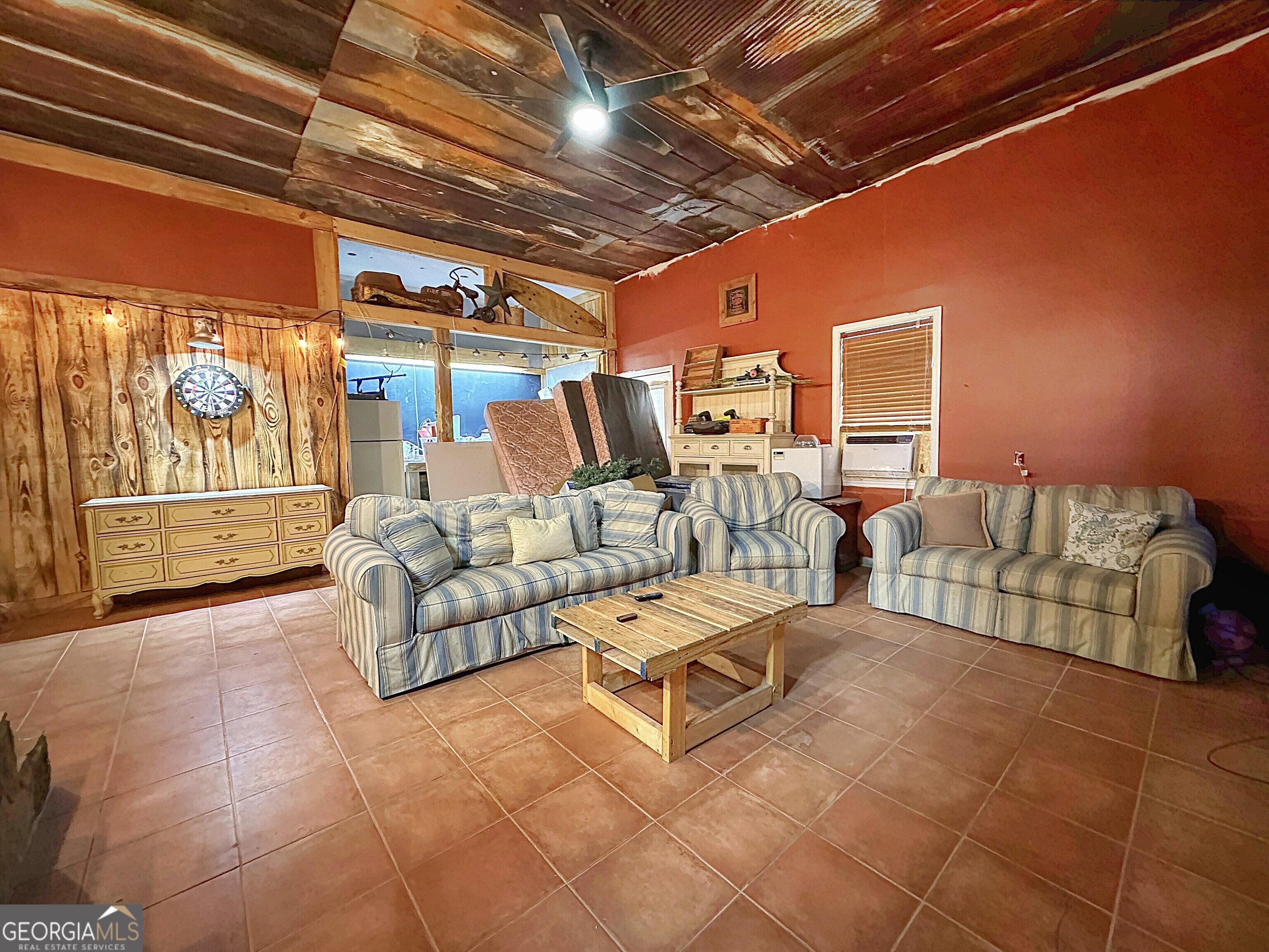 3900 Greenville Road LaGrange, GA 30241 - Photo 6 of 12 a outdoor space with lots of white furniture