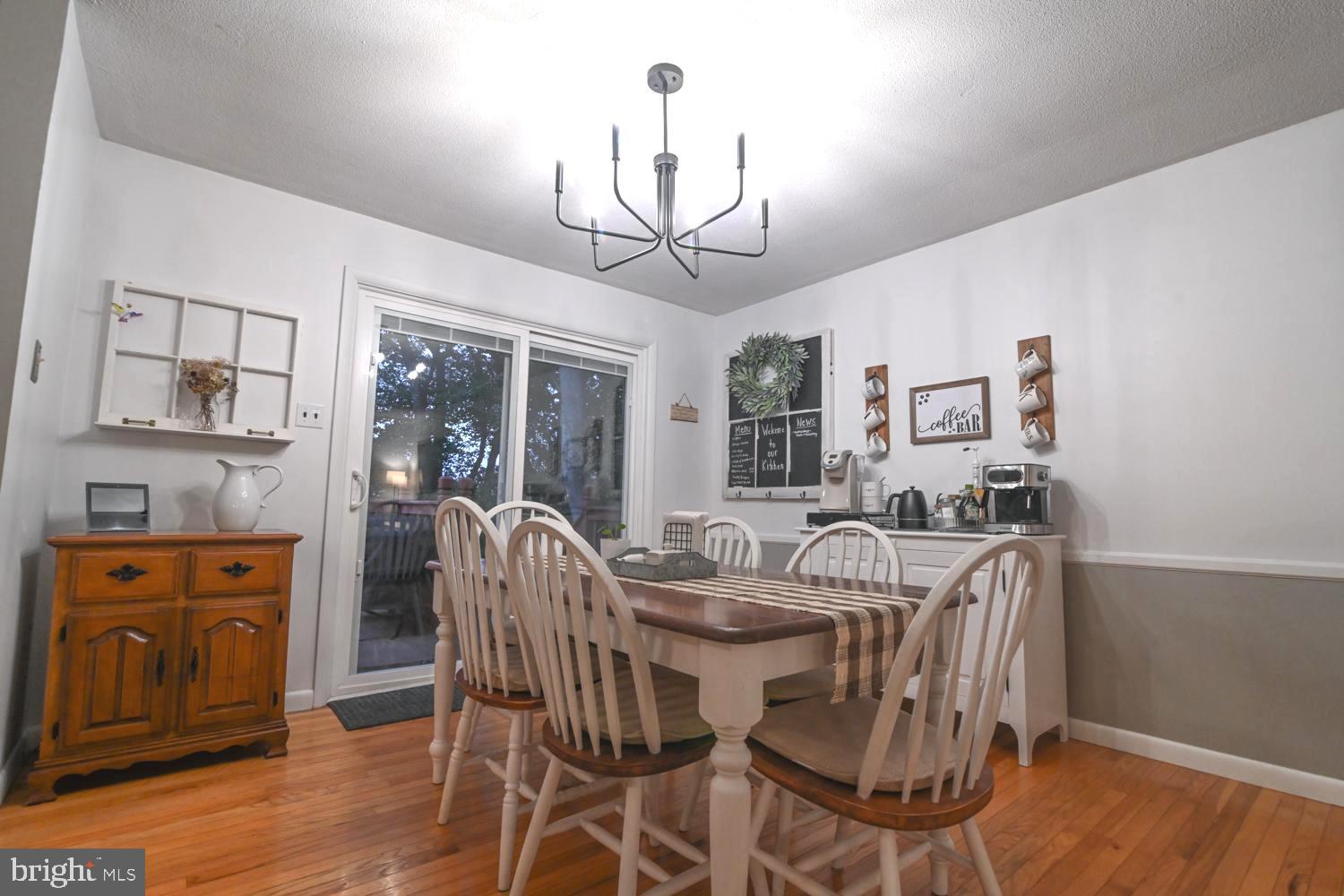 146 Lexington Road York, PA 17402 - Photo 15 of 35 a view of a dining room with furniture window and wooden floor