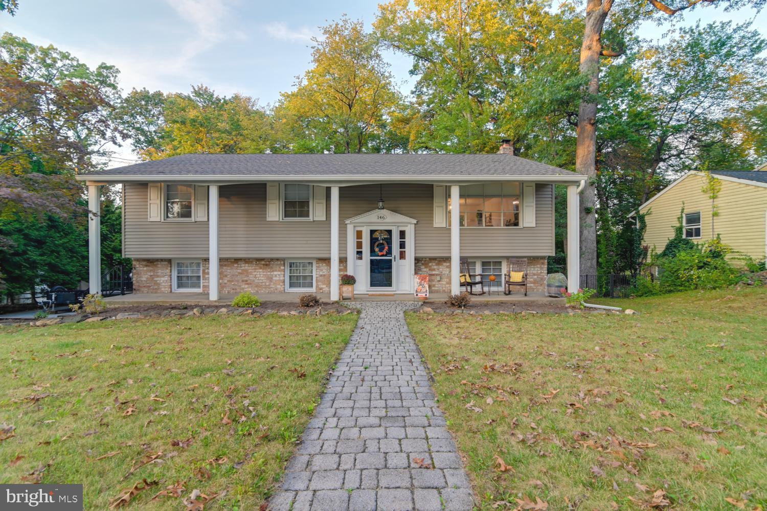 146 Lexington Road York, PA 17402 - Photo 2 of 35 a front view of a house with garden