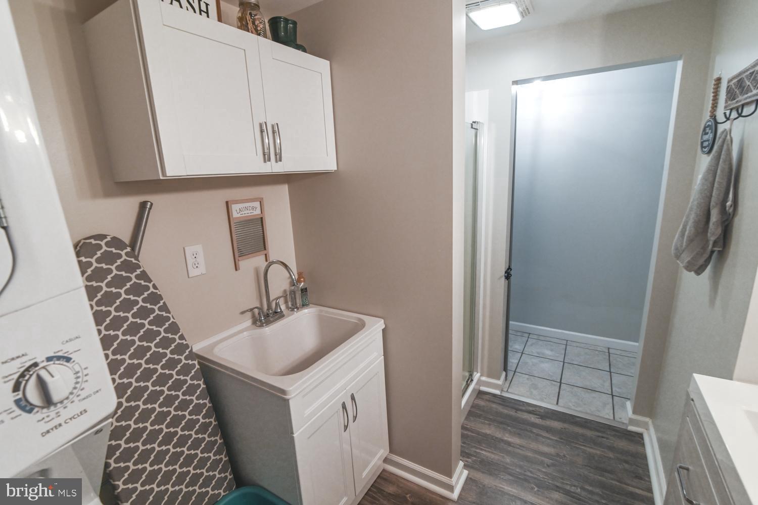 146 Lexington Road York, PA 17402 - Photo 28 of 35 a bathroom with a sink a mirror and shower