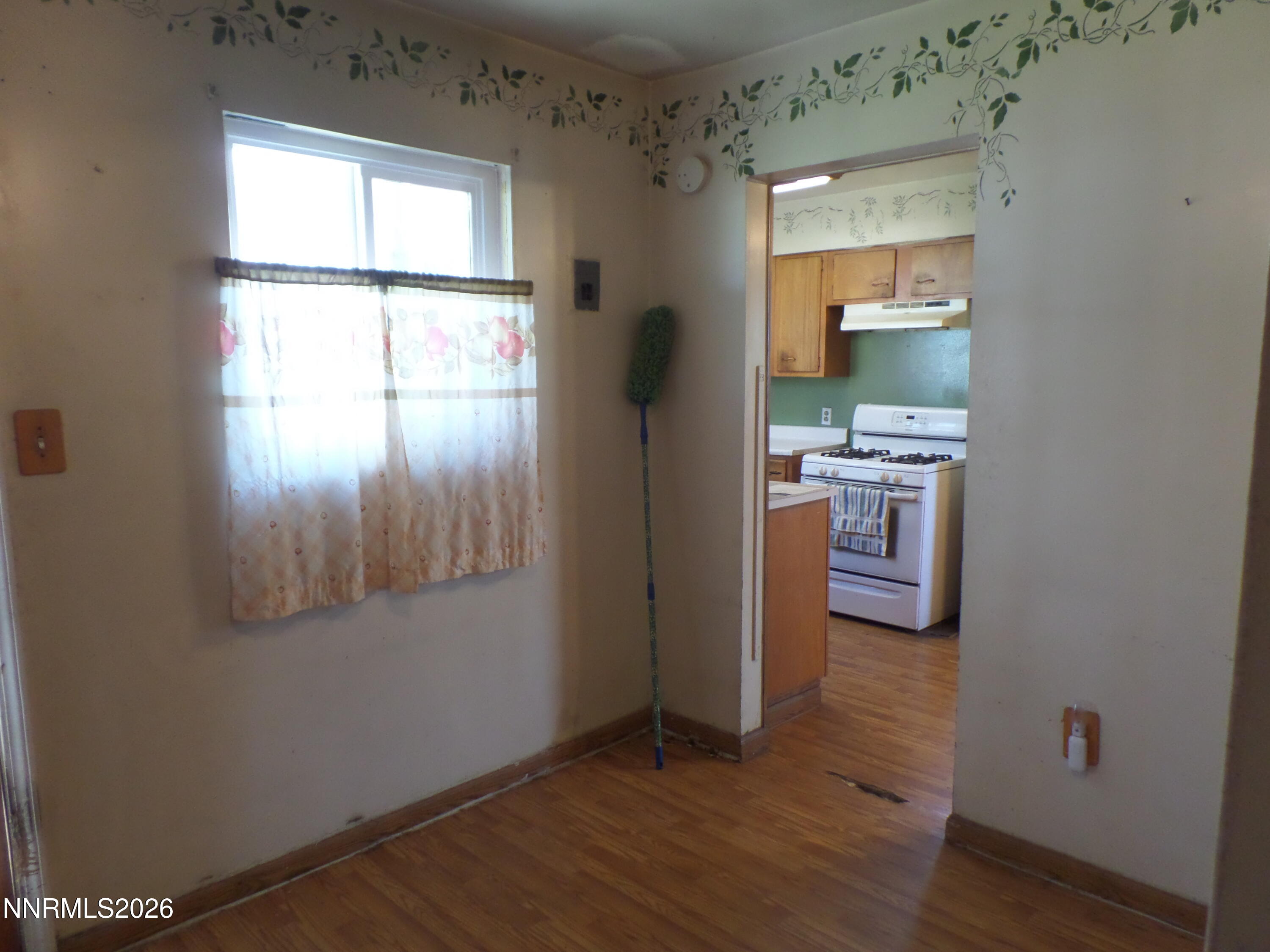 710 L Street Sparks, NV 89431 - Photo 4 of 11 a view of kitchen with sink and wooden floor