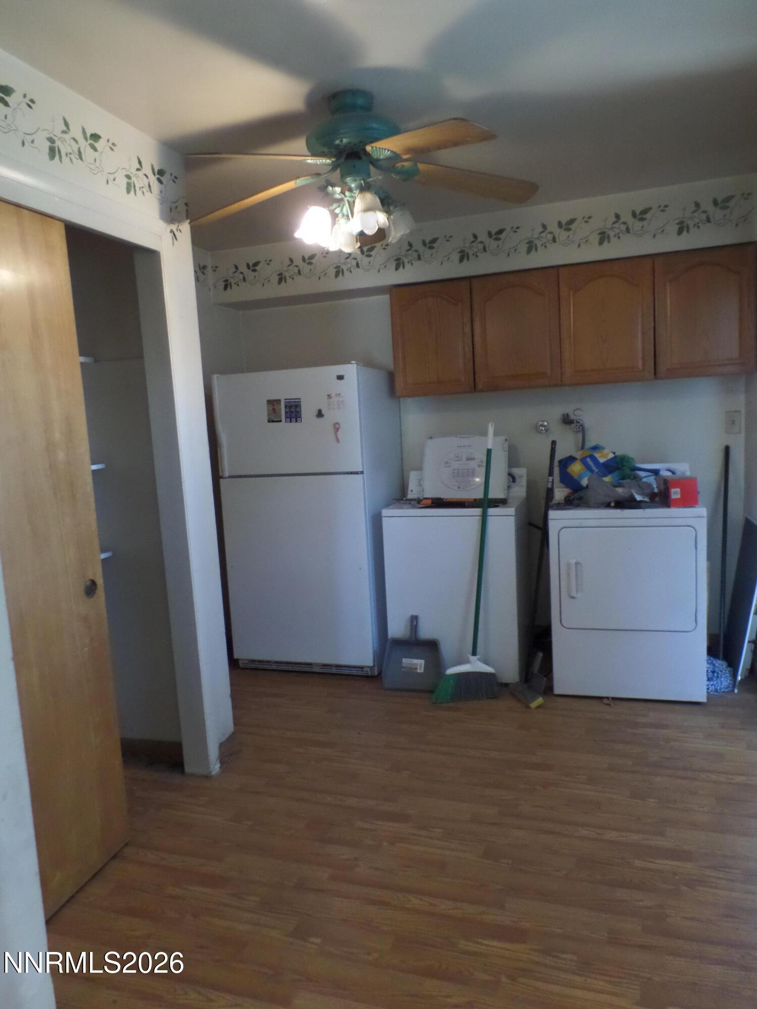 710 L Street Sparks, NV 89431 - Photo 5 of 11 a view of a storage & utility room with two washing machine