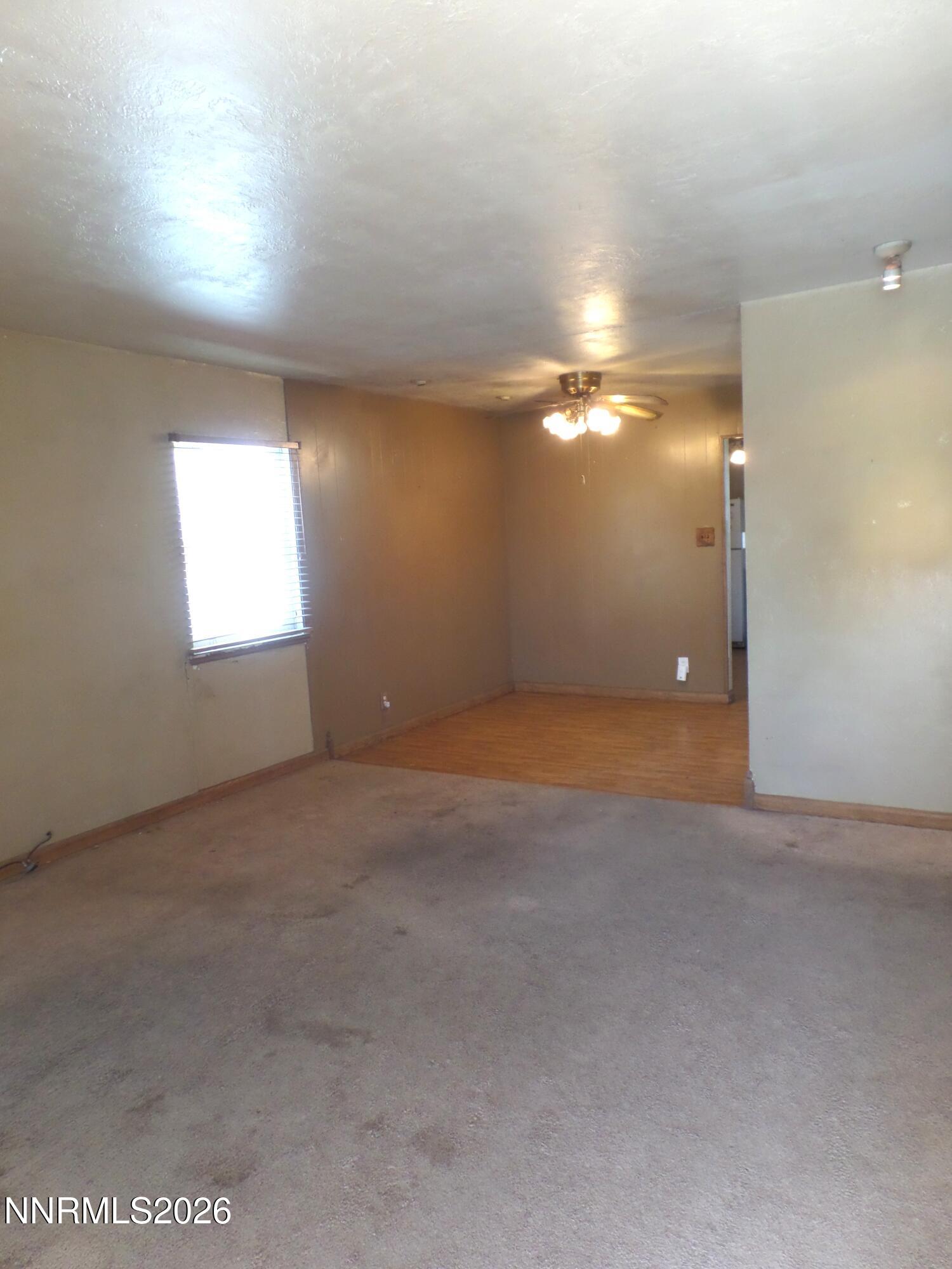 710 L Street Sparks, NV 89431 - Photo 7 of 11 an empty room with windows and closet in it