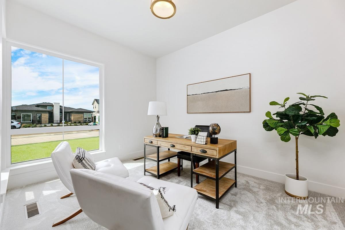 7026 Saddle Bred Way Star, ID 83669 - Photo 24 of 49 Office area featuring light carpet and baseboards