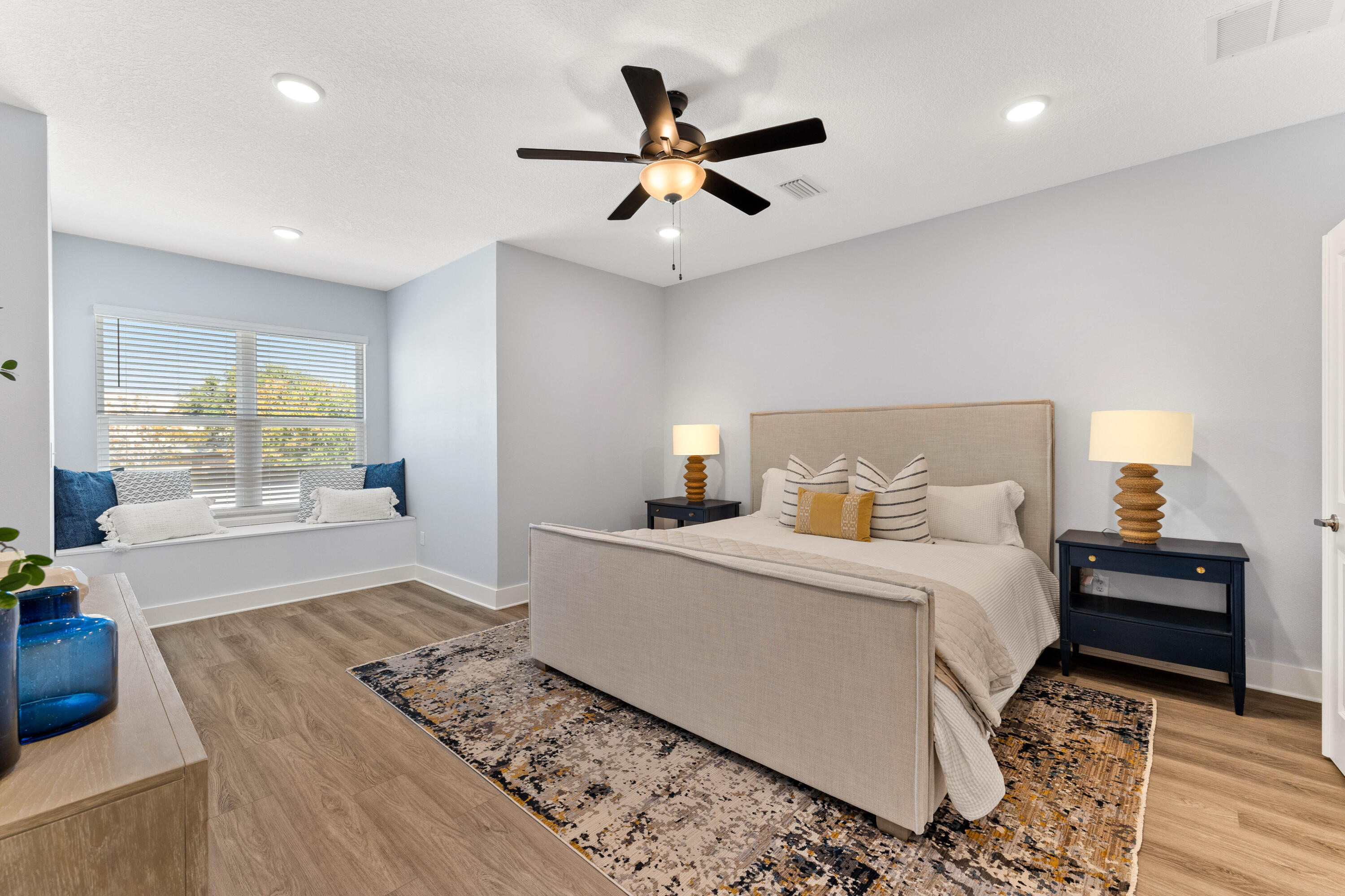 100 Beach Drive, Unit 9 Destin, FL 32541 - Photo 17 of 33 a bedroom with a bed and window