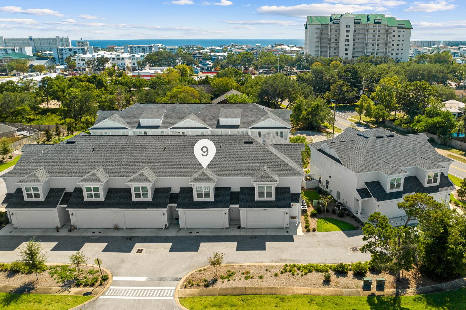 100 Beach Drive, Unit 9 Destin, FL 32541 - Photo 2 of 33 a aerial view of a house with a yard