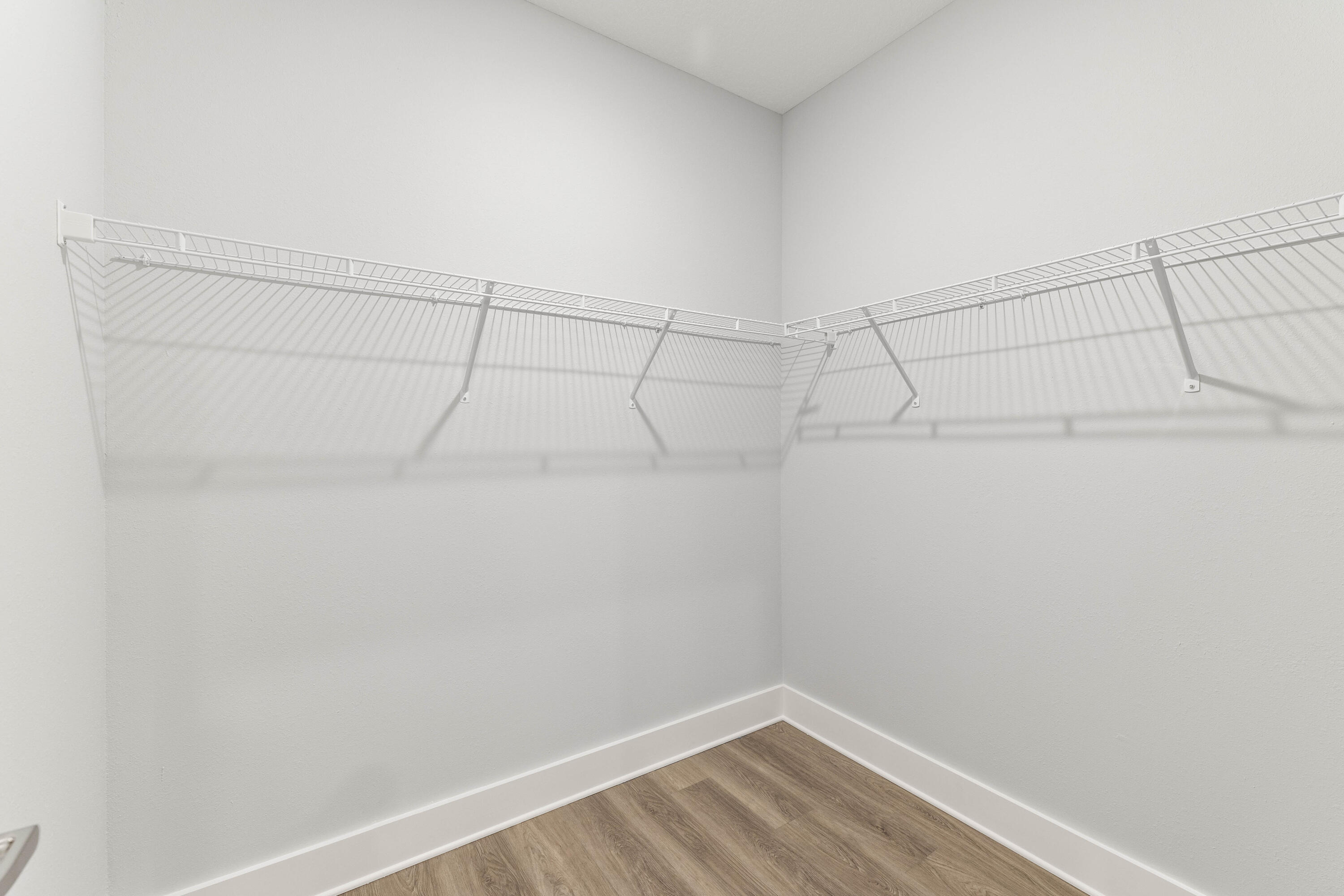 100 Beach Drive, Unit 9 Destin, FL 32541 - Photo 21 of 33 a view of a room with racks on the wall