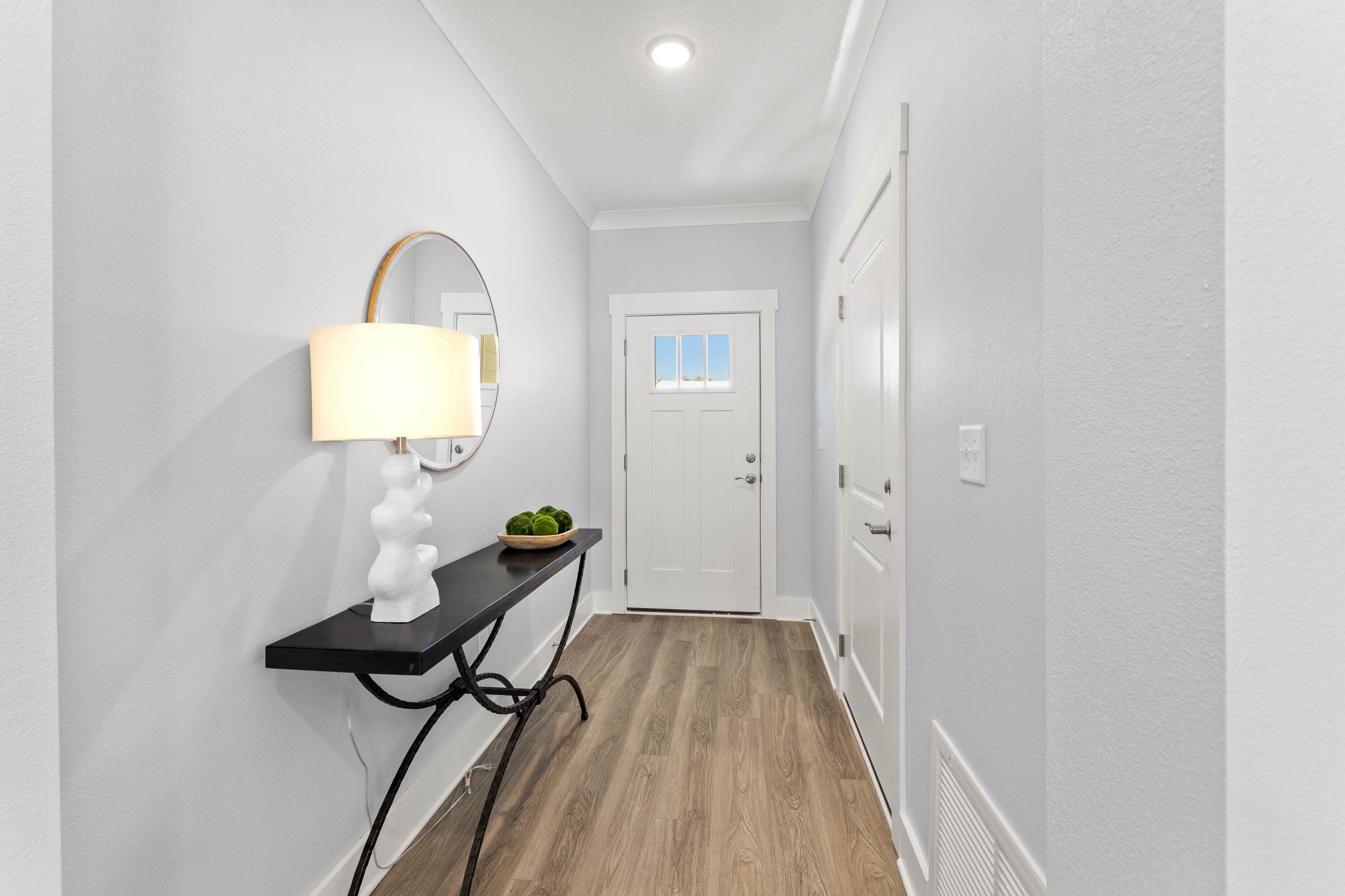 100 Beach Drive, Unit 9 Destin, FL 32541 - Photo 4 of 33 a view of a livingroom with furniture and wooden floor