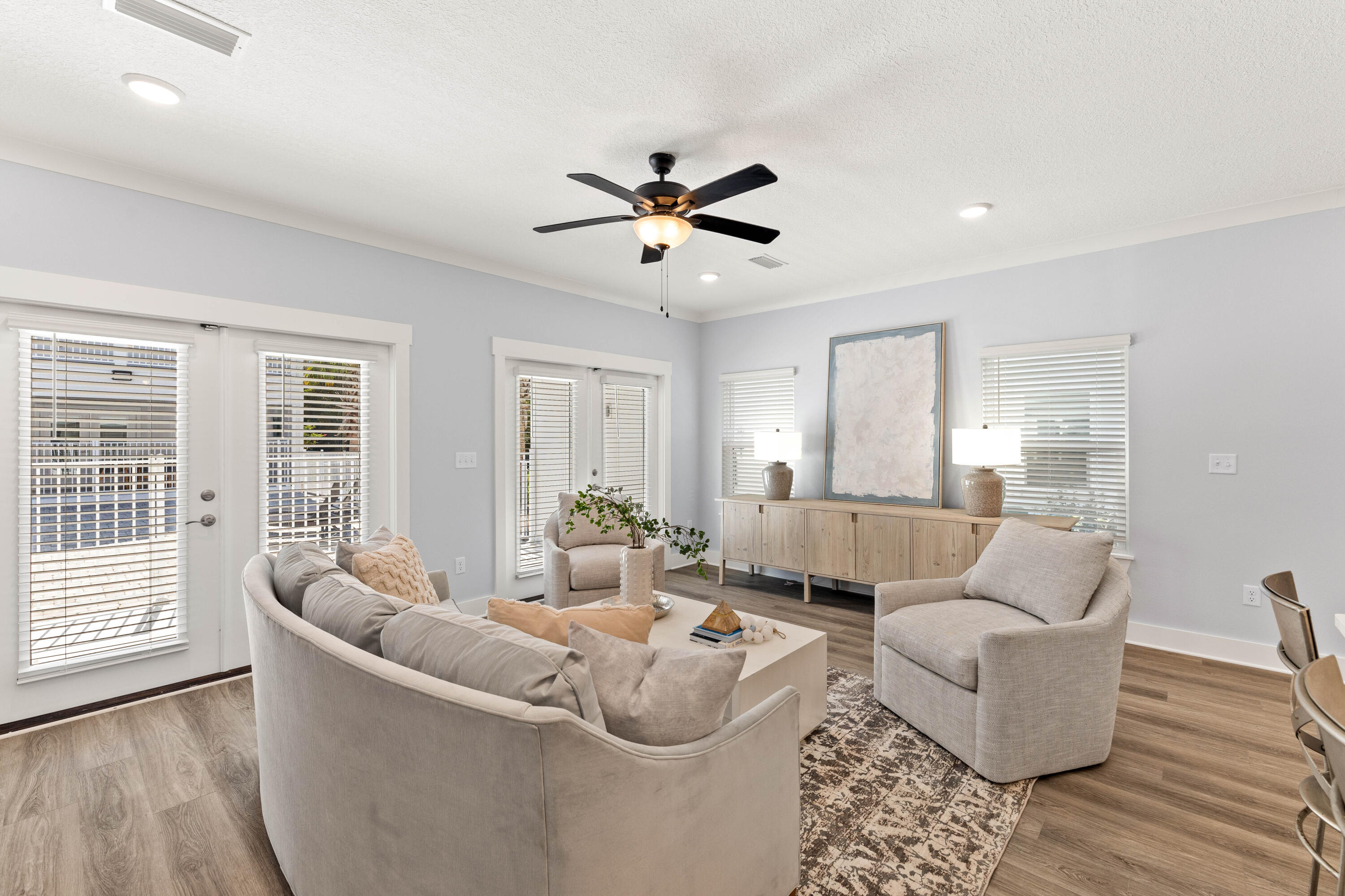 100 Beach Drive, Unit 9 Destin, FL 32541 - Photo 6 of 33 a living room with furniture and a large window