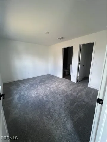 an empty room with an entryway
