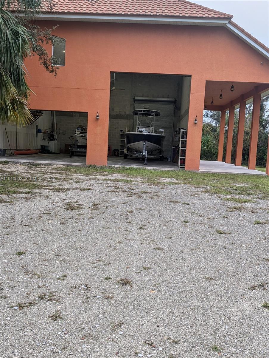 37511 Washington Loop Road Punta Gorda, FL 33982 - Photo 43 of 50 Large garage attached to Guest house