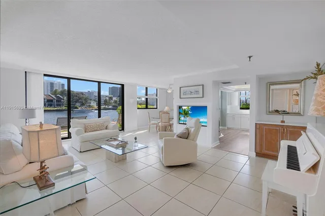 a living room with furniture and a table