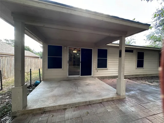 a porch with seating space and yard