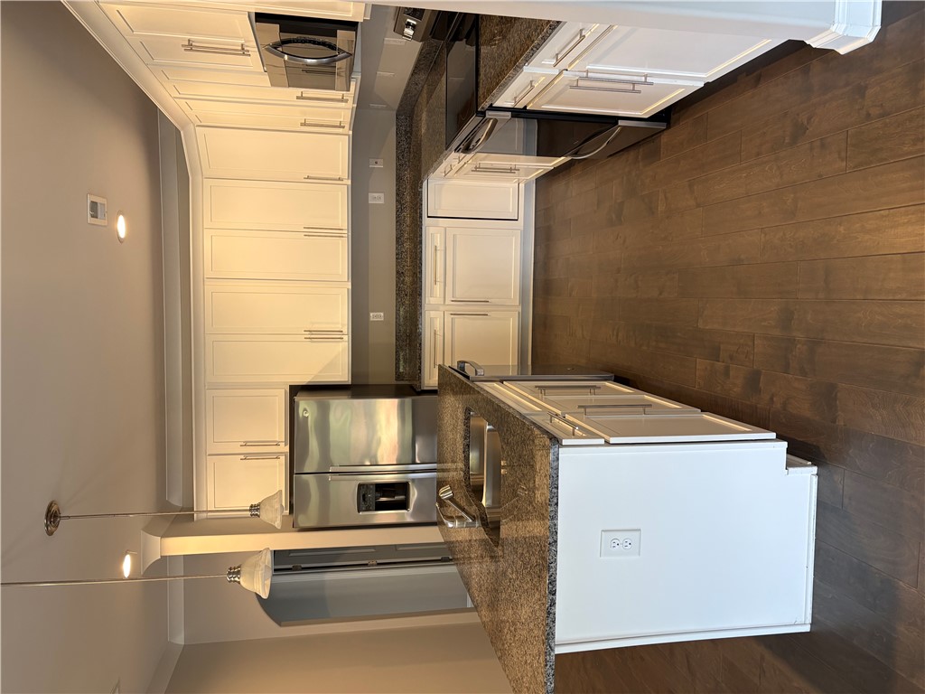 240 Meridian Way Seneca, SC 29672 - Photo 6 of 19 Culinary delights await in this modern kitchen with extensive cabinetry and an inviting island.