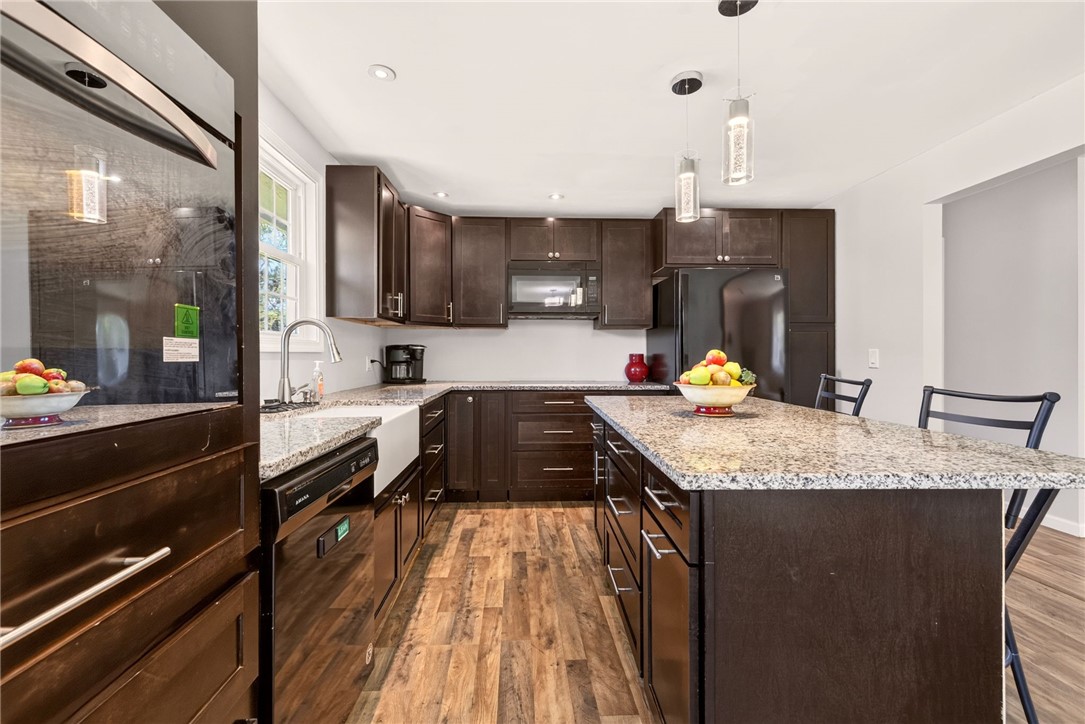 44 Friel Road Henrietta, NY 14623 - Photo 6 of 24 beautiful kitchen with island and pendant lights, recessed lights